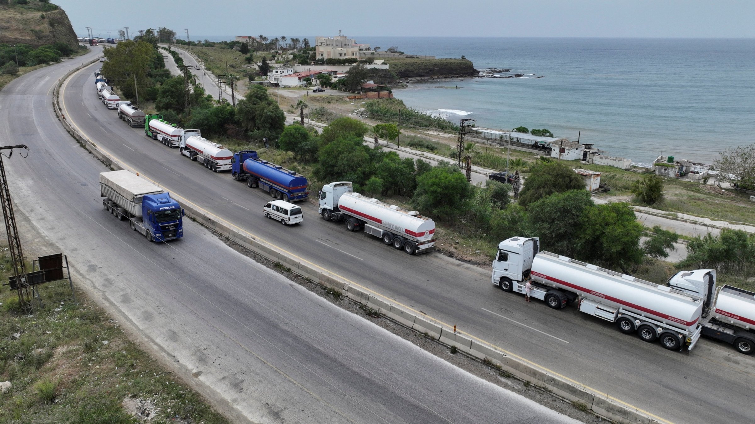 A drone view shows oil trucks arriving from Iraq on their way to the Baniyas oil terminal, Syria, May 14, 2026. (Reuters Photo)