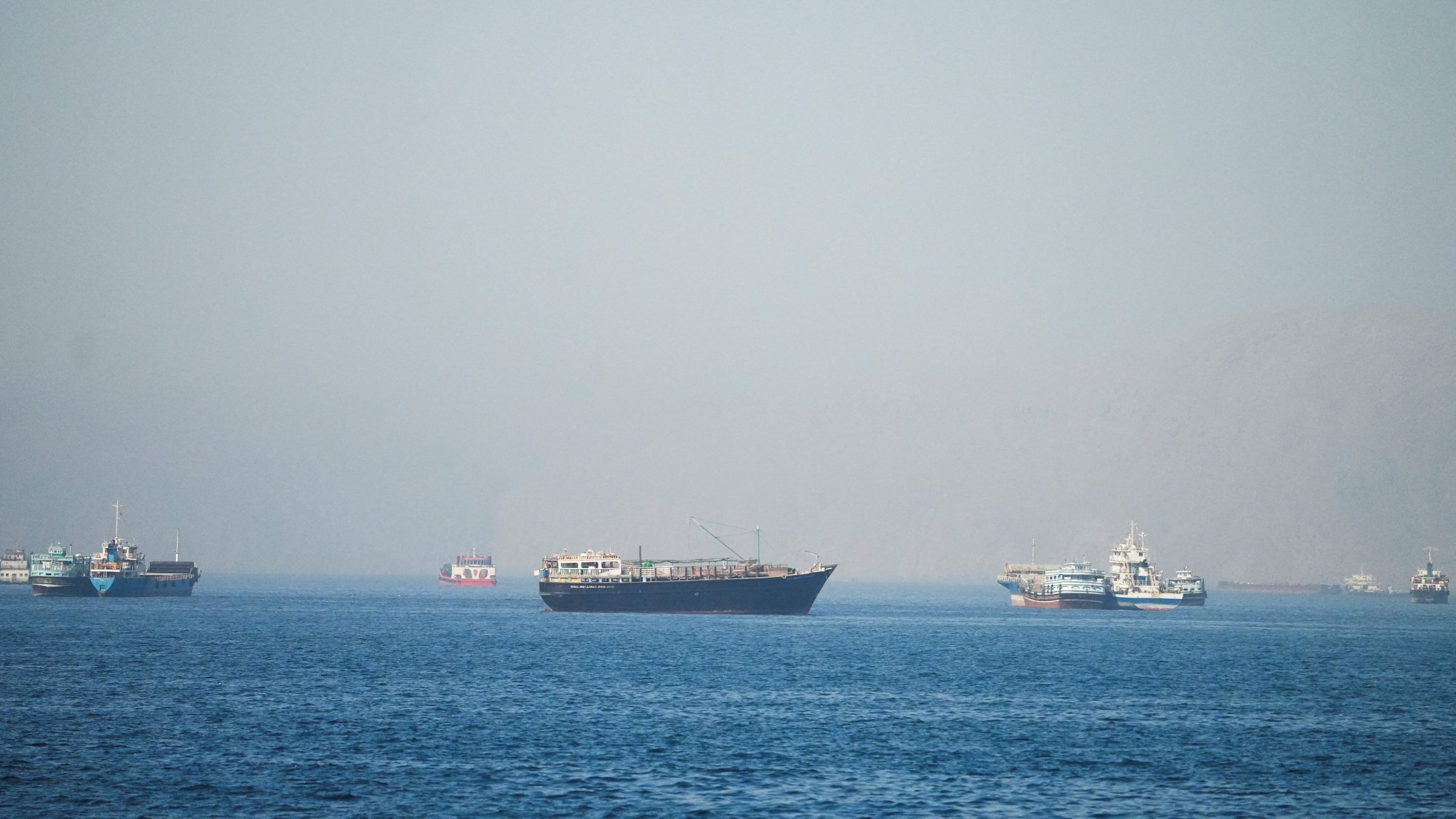 Vessels are seen at the Strait of Hormuz, as seen from Musandam, Oman, June 1, 2026. (Reuters Photo)