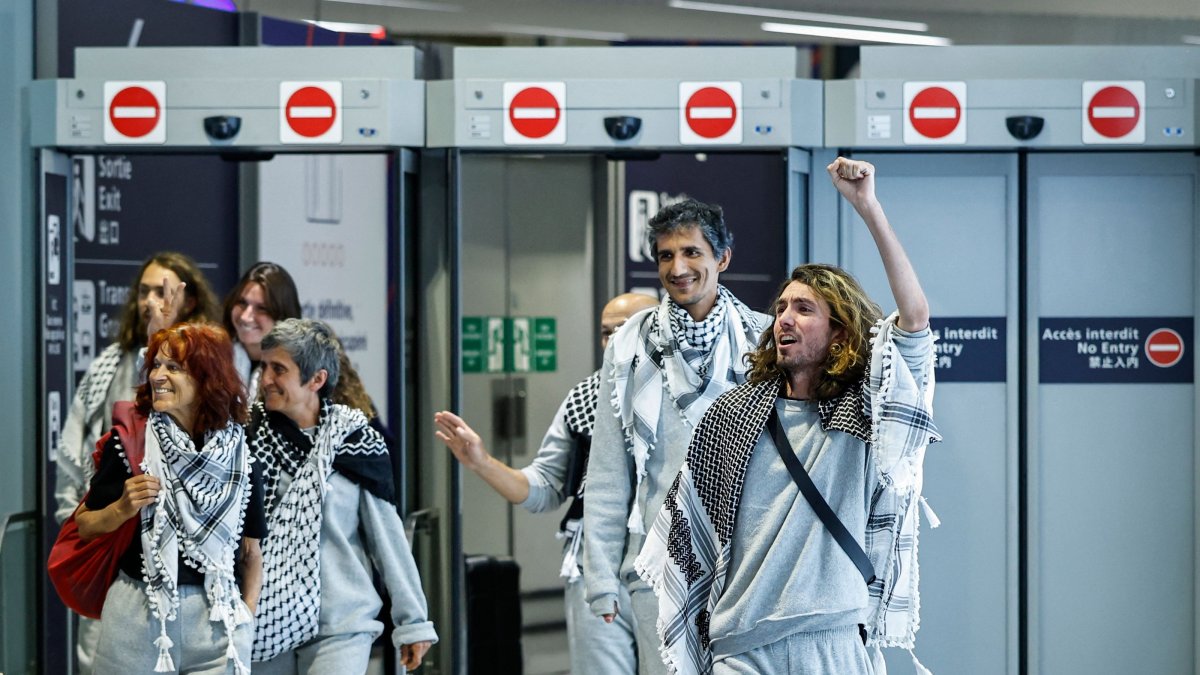 French activists detained and deported by Israel following the interception of their Gaza-bound flotilla arrive at Roissy Charles de Gaulle airport near Paris, France, May 22, 2026. (AFP Photo)