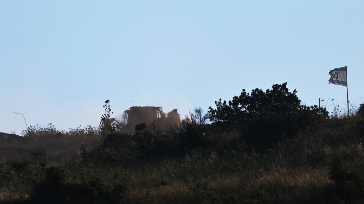 An Israeli army bulldozer on the Lebanese side of the border, as seen from the Upper Galilee in northern Israel, June 9, 2026. (EPA Photo)