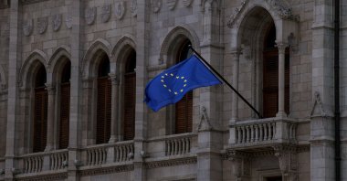 A flag of the EU flutters from the facade of the Hungarian Parliament, Budapest, Hungary, May 9, 2026. (Reuters Photo)