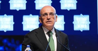 Treasury and Finance Minister Mehmet Şimşek speaks at an event, Istanbul, Türkiye, June 12, 2026. (AA Photo)