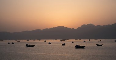 Ships and boats in the Strait of Hormuz, Musandam, Oman, May 1, 2026. (Reuters File Photo)