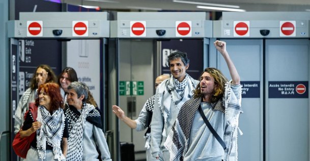 French activists detained and deported by Israel following the interception of their Gaza-bound flotilla arrive at Roissy Charles de Gaulle airport near Paris, France, May 22, 2026. (AFP Photo)