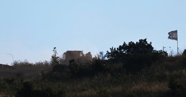 An Israeli army bulldozer on the Lebanese side of the border, as seen from the Upper Galilee in northern Israel, June 9, 2026. (EPA Photo)