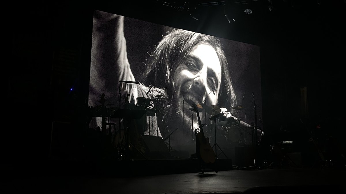 A portrait of legendary musician Kazım Koyuncu is displayed during a commemoration concert, Istanbul, Türkiye, June 20, 2026. (AA Photo)