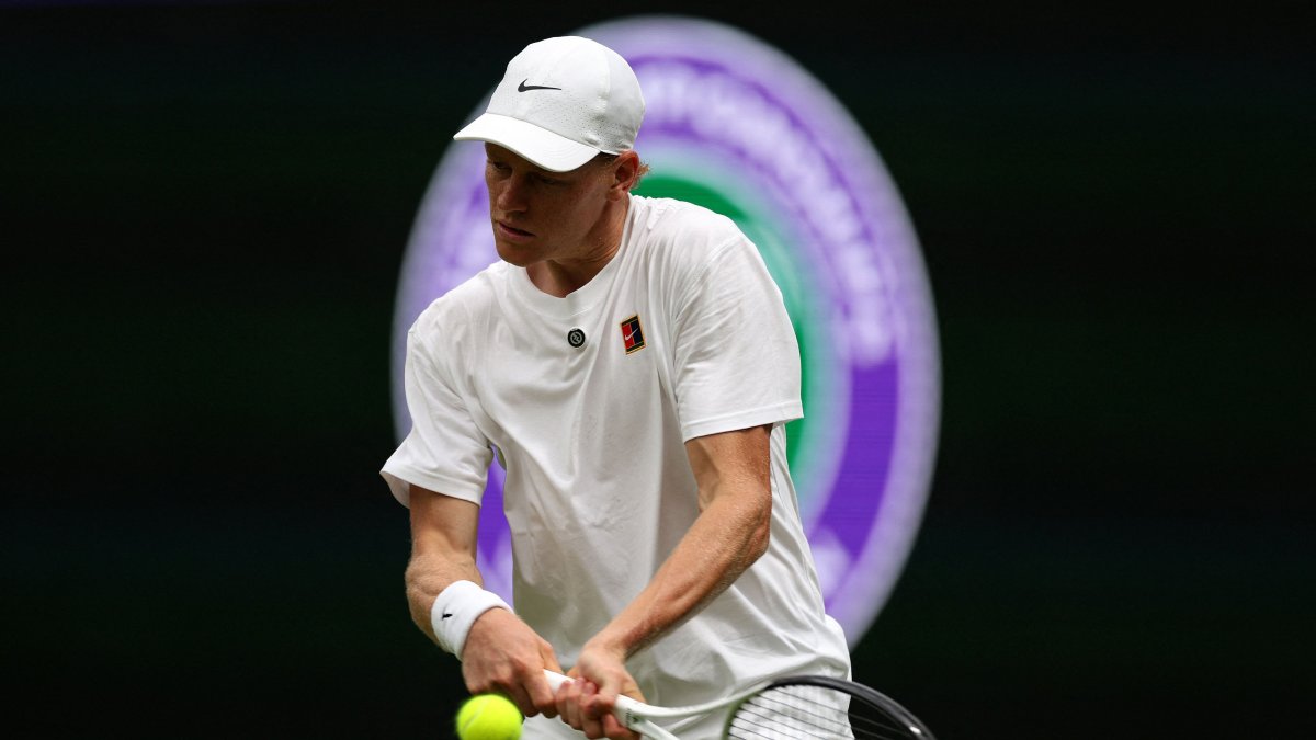 Italy's Jannik Sinner reacts as he practices with Serbia's Novak Djokovic on No. 1 Court ahead of the 2026 Wimbledon Championships, London, U.S., June 25, 2026. (AFP Photo)