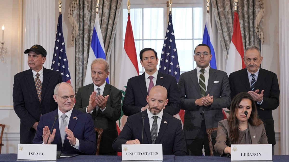 U.S. Secretary of State Marco Rubio and Israel's Ambassador to the U.S. Yechiel Leiter applaud after signing a framework agreement between Israel and Lebanon with State Department Counselor Daniel Holler, and Lebanon's Ambassador to the U.S. Nada Hamadeh, at the State Department in Washington, D.C., U.S., June 26, 2026. (Reuters Photo)