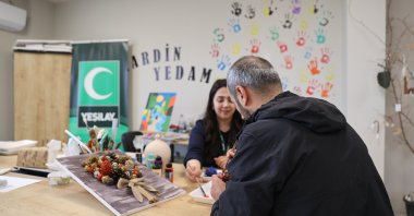 A man paints during his recovery after overcoming addiction with support from the Yeşilay Counseling Center (YEDAM), Mardin, Türkiye, April 29, 2026. (AA Photo)