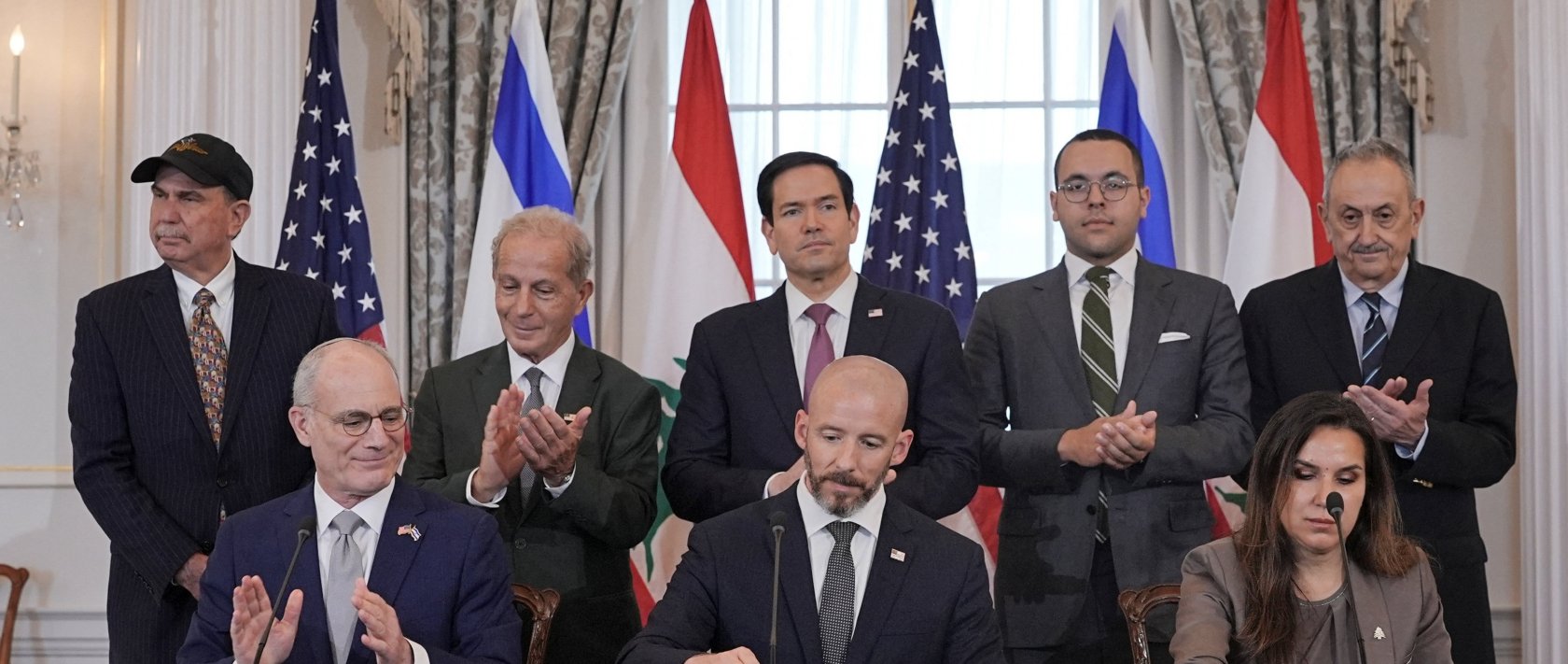 U.S. Secretary of State Marco Rubio and Israel's Ambassador to the U.S. Yechiel Leiter applaud after signing a framework agreement between Israel and Lebanon with State Department Counselor Daniel Holler, and Lebanon's Ambassador to the U.S. Nada Hamadeh, at the State Department in Washington, D.C., U.S., June 26, 2026. (Reuters Photo)