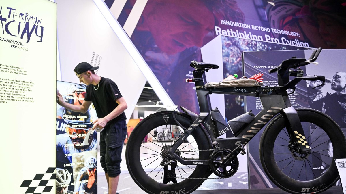 An employee prepares a booth at the Eurobike 2026 fair, Frankfurt, Germany, June 23, 2026. (AFP Photo)