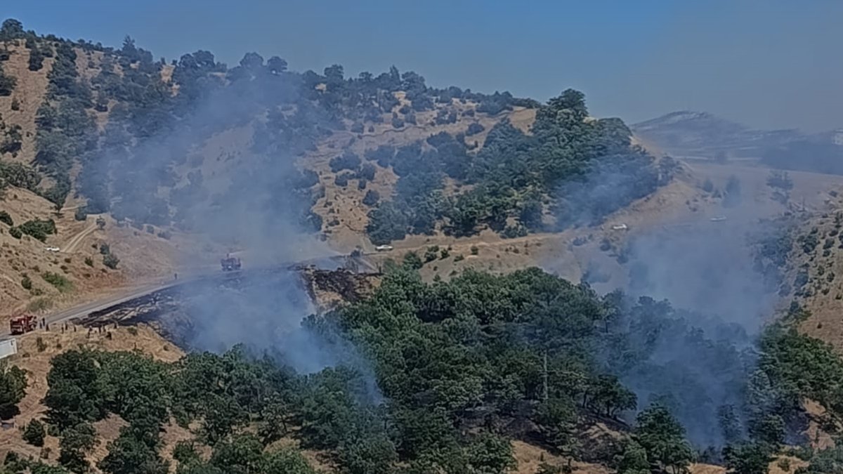 Firefighting teams work to contain a forest fire in the Onikişubat district, Kahramanmaraş, Türkiye, June 27, 2026. (AA Photo) 