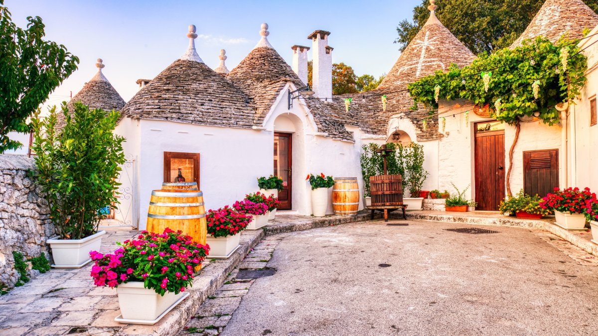 Famous trulli houses during a sunny day, Alberobello, Italy. (Shutterstock Photo)