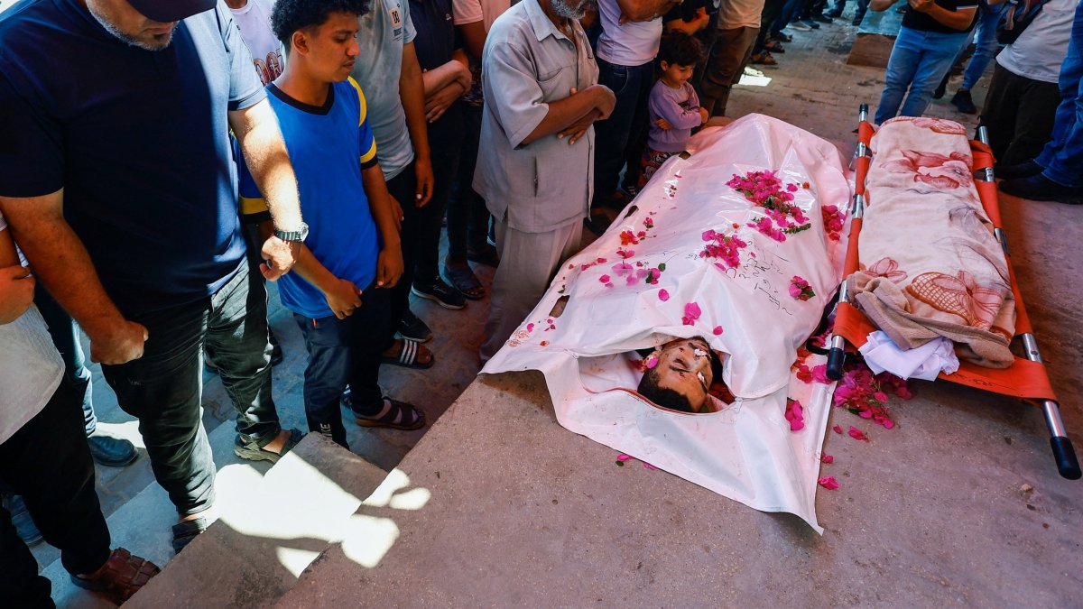 Mourners attend the funeral of Palestinians who were killed in an Israeli strike, according to medics, at Al-Aqsa Martyrs Hospital in Deir al-Balah, in the central Gaza Strip, June 29, 2026. (Reuters Photo)