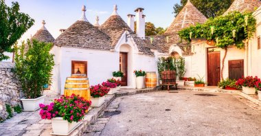 Famous trulli houses during a sunny day, Alberobello, Italy. (Shutterstock Photo)