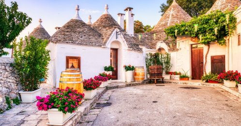 Famous trulli houses during a sunny day, Alberobello, Italy. (Shutterstock Photo)