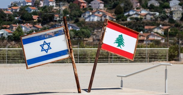 Representations of the Israeli and Lebanese flags are seen at a memorial near the Israel-Lebanon border, June 27, 2026. (Reuters Photo)