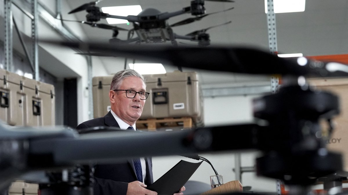 Britain's Prime Minister Keir Starmer stands beneath a display of drones as he delivers a speech in Berkshire, west of London, U.K., June 30, 2026. (AFP Photo)