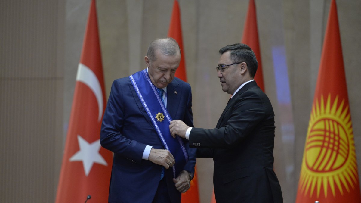President Recep Tayyip Erdoğan is awarded The Order of Manas by Kyrgyz President Sadyr Japarov during a ceremony, Bishkek, Kyrgyzstan, Nov. 5, 2024. (AP Photo)