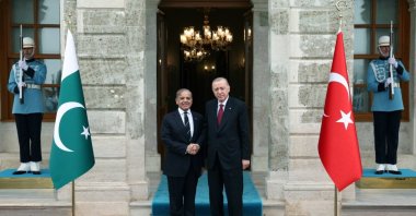 President Recep Tayyip Erdoğan shakes hands with Pakistani Prime Minister Shahbaz Sharif at Dolmabahçe Palace, Istanbul, Türkiye, May 25, 2025. (IHA Photo)
