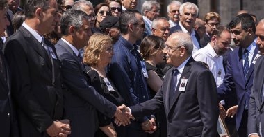 Republican People's Party (CHP) leader Kemal Kılıçdaroğlu and CHP parliamentary group leader Özgür Özel shake hands during a funeral ceremony for former CHP lawmaker, Ankara, Türkiye, June 25, 2026. (AA Photo)