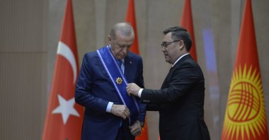 President Recep Tayyip Erdoğan is awarded The Order of Manas by Kyrgyz President Sadyr Japarov during a ceremony, Bishkek, Kyrgyzstan, Nov. 5, 2024. (AP Photo)