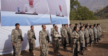 The PKK terrorist group prepares to withdraw from Türkiye during a ceremony in the Qandil area, northern Iraq, Oct 26, 2025. (AP Photo)
