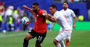 Mohamed Salah of Egypt battles for the ball with Ali Nemati of Iran during the FIFA World Cup 2026 Group G match between Egypt and IR Iran at Seattle Stadium, June 26, 2026. (AFP Photo)