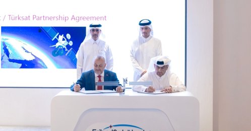 Es'hailSat Chair and CEO Ali Ahmed Al-Kuwari (bottom R), Türksat General Manager Ahmet Hamdi Atalay (bottom L), sign strategic partnership agreement, Doha, Qatar, June 30, 2026. (AA Photo)