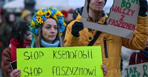 
A Ukrainian activist displays a placard reading 'Stop Ksenofobii, Stop Faszyzmowi' (Stop Xenophobia, Stop Fascism) during an Anti-Fascist March in central Krakow, Lesser Poland Voivodeship, Poland, Dec. 14, 2025. (AFP File Photo)
