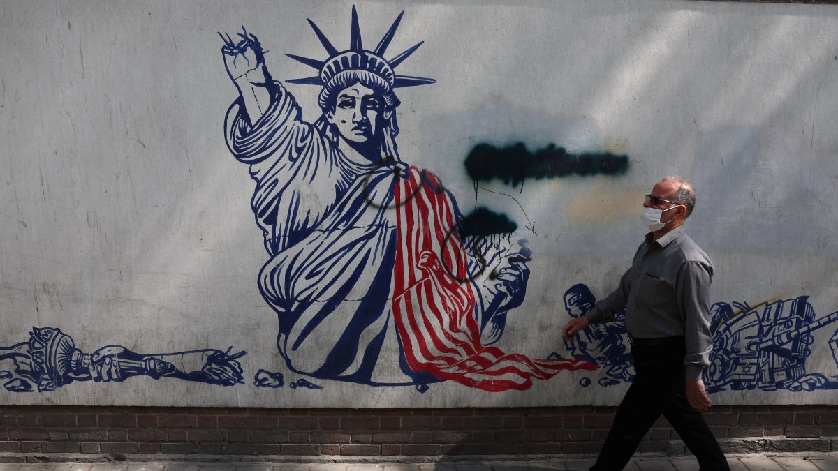 A man walks near an anti-U.S. mural, Tehran, Iran, June 30, 2026. (Reuters Photo)