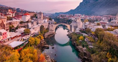 An aerial view of the historic old bridge in Mostar, Bosnia-Herzegovina. (Shutterstock Photo)