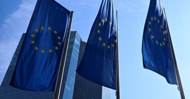 European Union flags flutter outside the European Central Bank (ECB) headquarters, Frankfurt, Germany, March 19, 2026. (Reuters Photo)