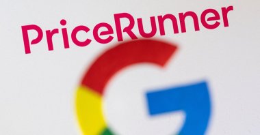 A 3D printed Google logo is seen in front of a displayed PriceRunner logo in this photo illustration taken on Feb. 8, 2022. (Reuters Photo)