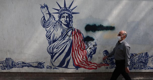 A man walks near an anti-U.S. mural, Tehran, Iran, June 30, 2026. (Reuters Photo)
