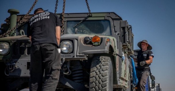 A tactical vehicle sits in a flatbed truck at the Logistics Support Area, in a location given as near Kerem Shalom, southern Israel, June 30, 2026. (Reuters Photo)