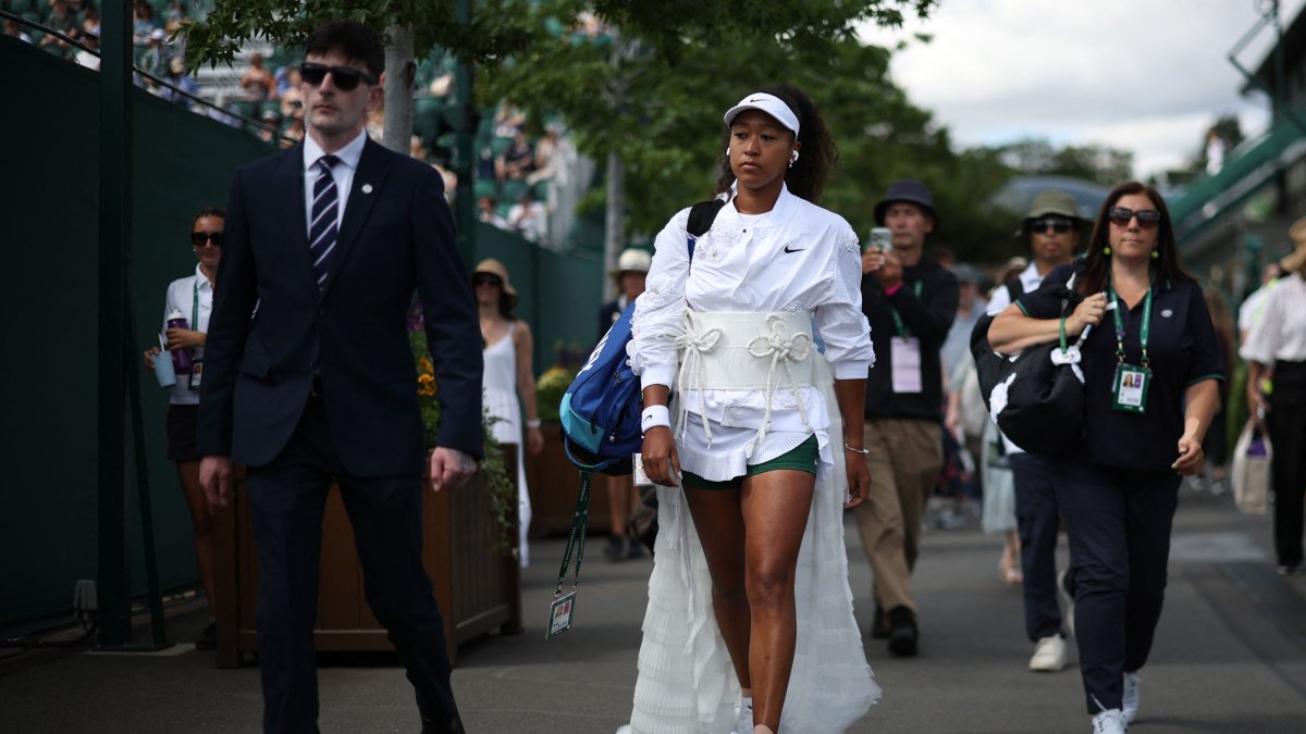 Japan's Naomi Osaka walks to court 2 for their women's singles second-round tennis match on the third day of the 2026 Wimbledon Championships at The All England Lawn Tennis and Croquet Club in Wimbledon, London, U.K., July 1, 2026. (AFP Photo)