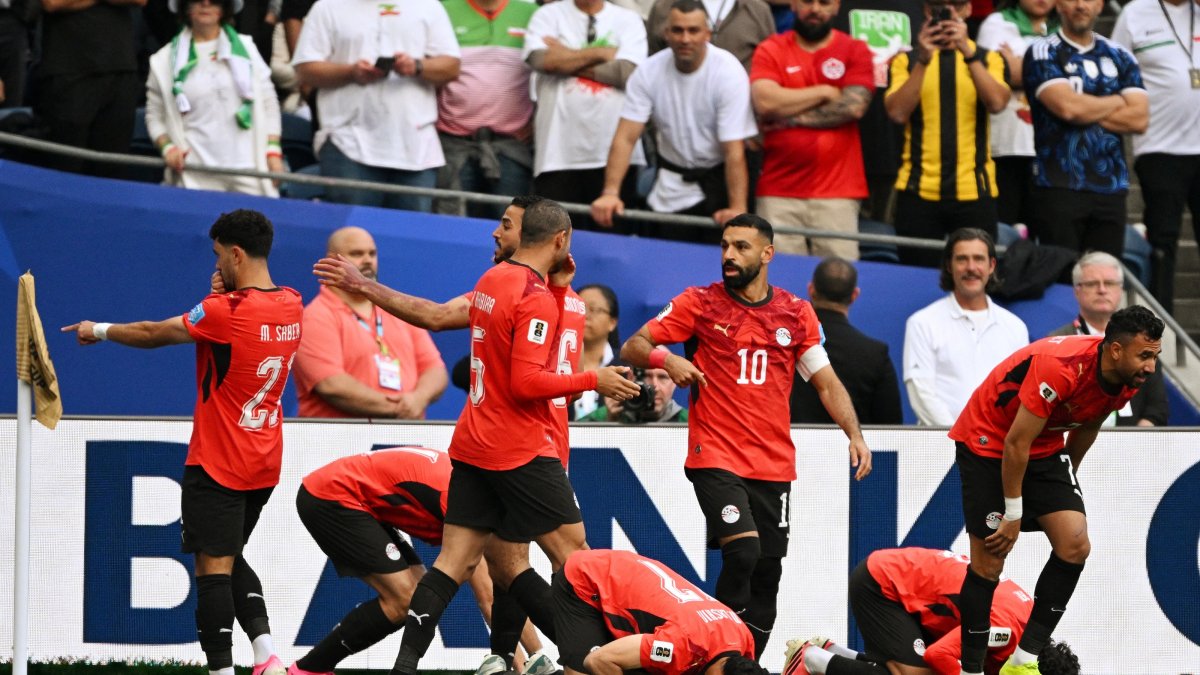 Egypt's Mahmoud Saber (L) celebrates scoring with Mohamed Salah (2nd R) and teammates during the 2026 FIFA World Cup Group G match against Iran at Seattle Stadium, Seattle, U.S., June 26, 2026. (Reuters Photo)