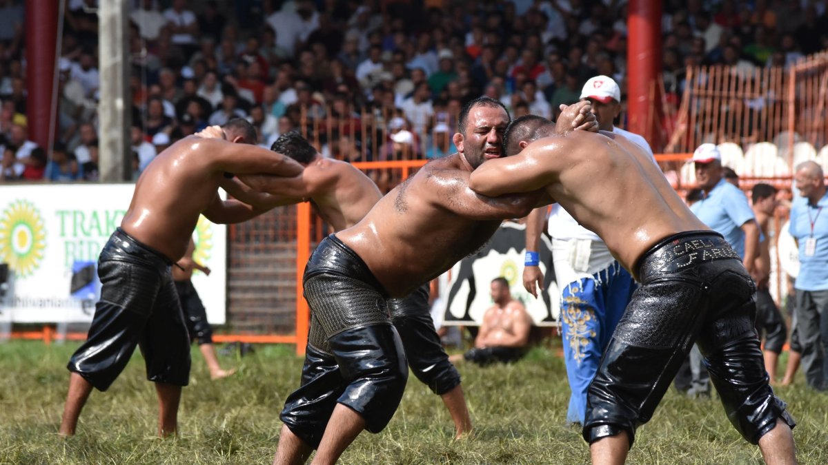 Turkish oil wrestlers in action during the 664th Historic Kırkpınar Oil Wrestling Festival, Edirne, Türkiye, July 6, 2025. (DHA Photo)