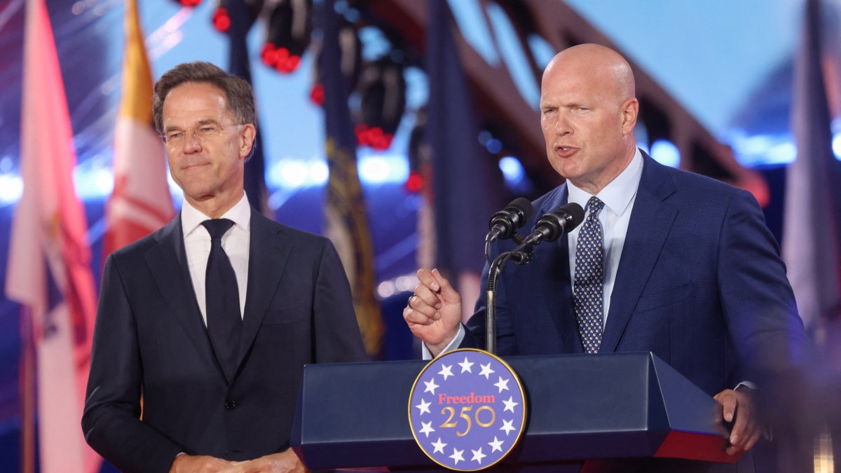 U.S. Ambassador to NATO Matthew Whitaker (R) speaks as NATO Secretary General Mark Rutte stands at an event in Brussels, Belgium, June 28, 2026. (Reuters Photo)