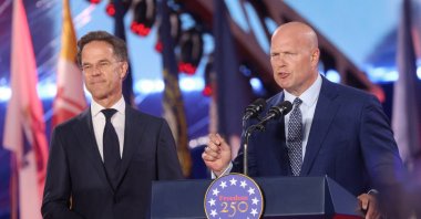 U.S. Ambassador to NATO Matthew Whitaker (R) speaks as NATO Secretary General Mark Rutte stands at an event in Brussels, Belgium, June 28, 2026. (Reuters Photo)
