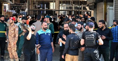 Syrian security forces and people gather at the site of an explosion at a cafe in the capital Damascus, Syria, July 2, 2026. (AFP Photo)
