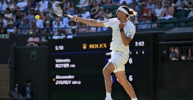 Germany's Alexander Zverev returns against France's Valentin Royer during their men's singles second-round tennis match on the fourth day of the 2026 Wimbledon Championships at The All England Lawn Tennis and Croquet Club in Wimbledon, southwest London, U.K., July 2, 2026. (AFP Photo)