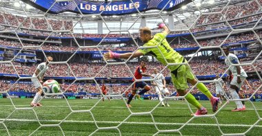 Austria's goalkeeper Alexander Schlager concedes Spain's second goal scored by defender Pedro Porro (C) during the 2026 World Cup round of 32 football match between Spain and Austria at the Los Angeles Stadium, Inglewood, California, U.S., July 2, 2026. (AFP Photo)