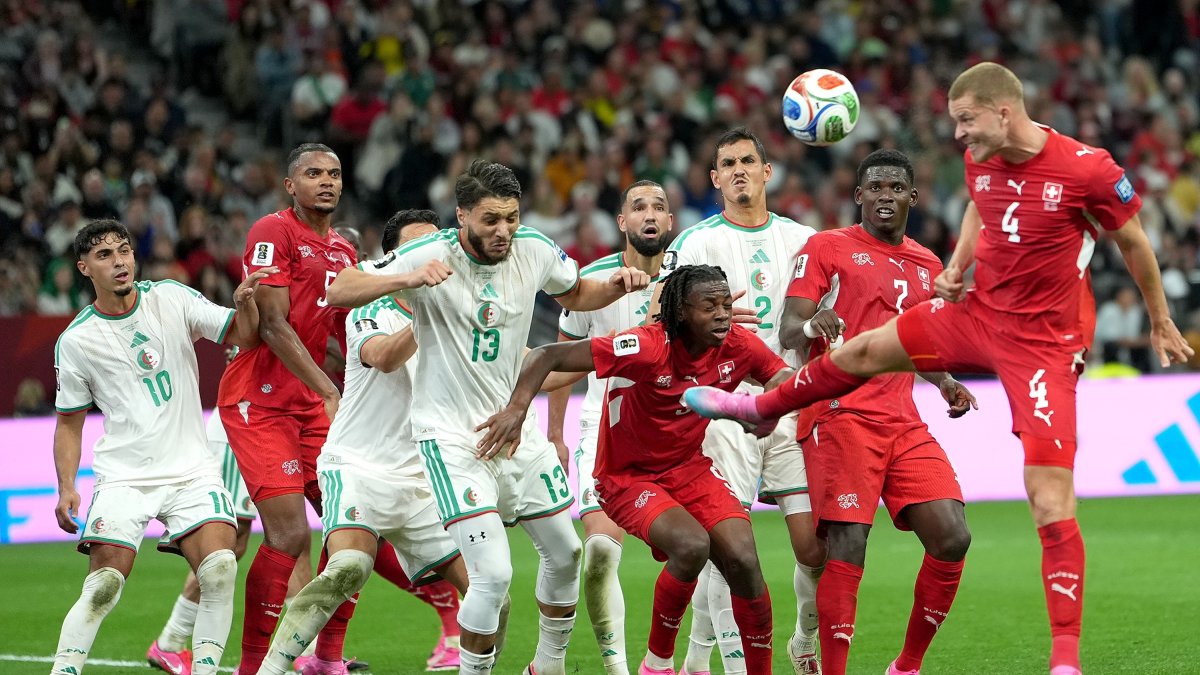 Switzerland's Nico Elvedi (R) heads the ball during the FIFA World Cup 2026 Round of 32 match against Algeria, Vancouver, Canada, July 2, 2026. (EPA Photo)