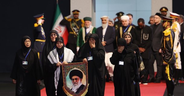Women holding a portrait of late Iranian Supreme Leader Ayatollah Ali Khamenei pay their respects before his state funeral at the Imam Khomeini Hussainiyah, Tehran, Iran, July 3, 2026. (EPA Photo)