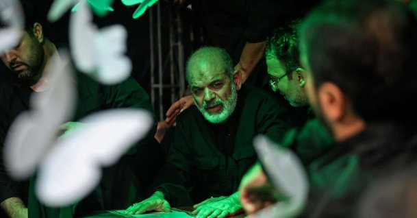 Iran Revolutionary Guard Corps Chief Ahmad Vahidi (C) pays respect at the coffin of Iran's slain supreme leader Ali Khamenei during a ceremony ahead of his funeral, Tehran, Iran, July 3, 2026. (AFP Photo)