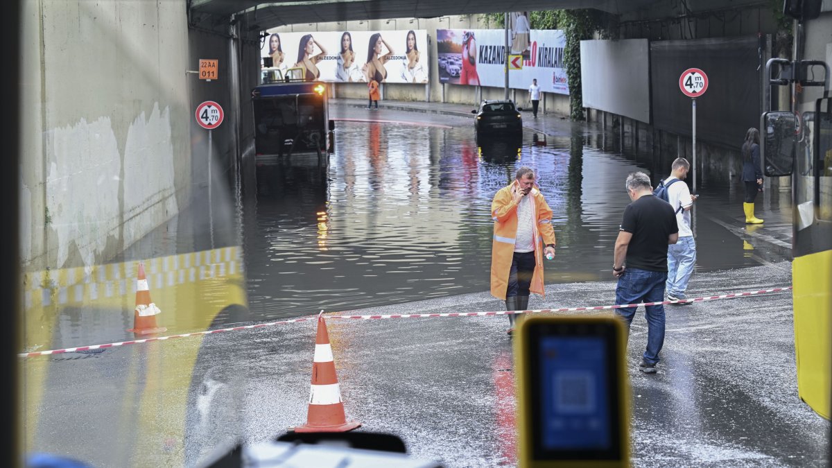 People walk through an underpass in Levent, which was closed to traffic due to flooding, Istanbul, Türkiye, July 4, 206. (AA Photo)
