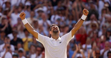 Serbia's Novak Djokovic celebrates after winning his third-round Wimbledon match against France's Arthur Rinderknech at All England Lawn Tennis and Croquet Club, London, U.S., July 3, 2026. (Reuters Photo)