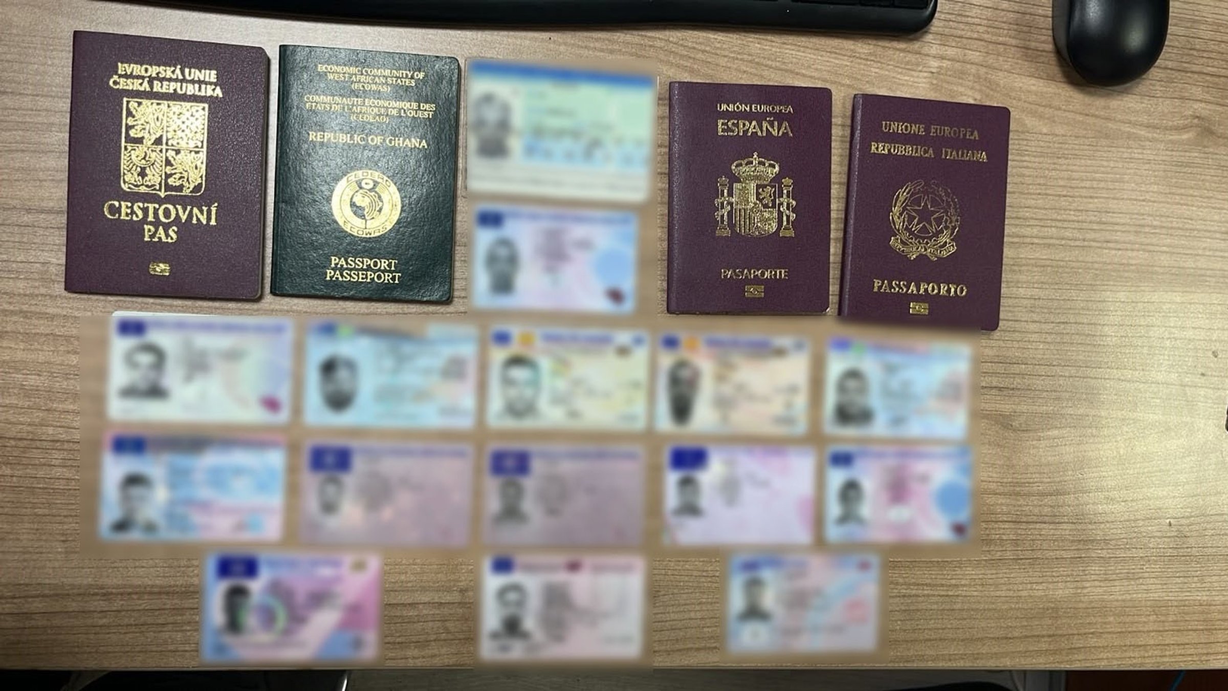 Forged passports, identity cards and driver's licenses seized during a police operation are displayed, Istanbul, Türkiye, July 5, 2026. (AA Photo) 